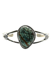 Cuff with 2 bar half round with 1" x 3/4" pear shaped genuine turquoise stone with peyote button.Cuff measures 5" with 1 1/4" opening.Native American made.